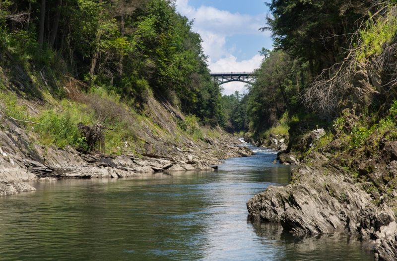 A dramatic view of the bridge over the Quechee Gorge near Quechee State Park, one of the top things to do near Woodstock, VT