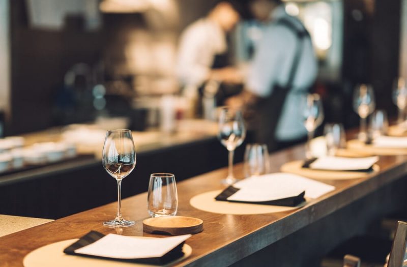 Blurred background of a restaurant and kitchen, like those at the best Woodstock, VT restaurants