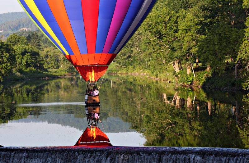 A balloon on the flat waters at the Quechee Balloon Festival in Vermont
